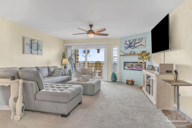 10443 Gulf Beach Hwy Unit 1, Pensacola, FL 32507 - living area with light colored carpet and a ceiling fan
