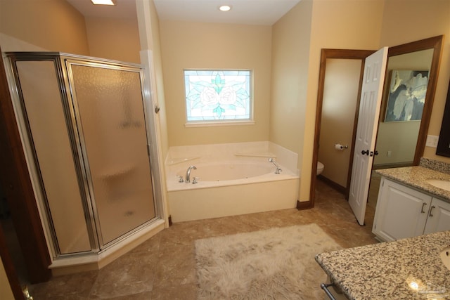 full bathroom with toilet, a stall shower, vanity, and a bath