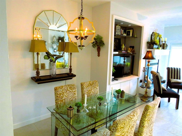 dining space featuring an inviting chandelier