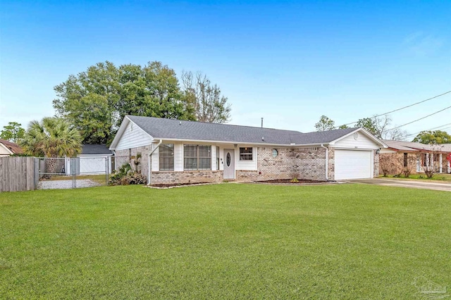 ranch-style house featuring a front yard and a garage