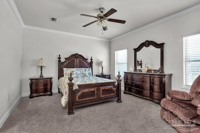 bedroom with ornamental molding, visible vents, light carpet, and baseboards