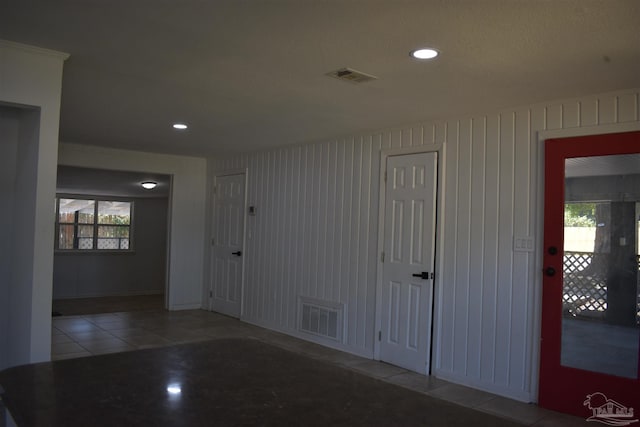 foyer with recessed lighting, tile patterned flooring, and visible vents
