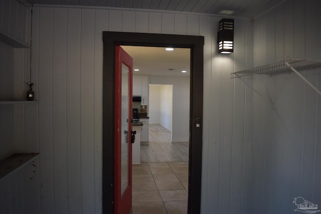 interior space with light tile patterned floors