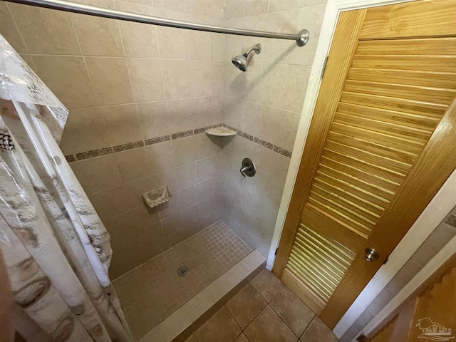 7844 Bay Meadows Dr, Pensacola, FL 32507 - bathroom featuring tile patterned flooring and a stall shower