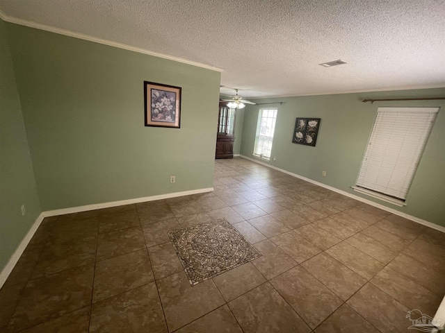 7844 Bay Meadows Dr, Pensacola, FL 32507 - tiled empty room with a ceiling fan, a textured ceiling, baseboards, ornamental molding, and visible vents