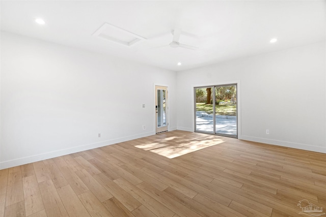 spare room featuring ceiling fan and light wood-type flooring