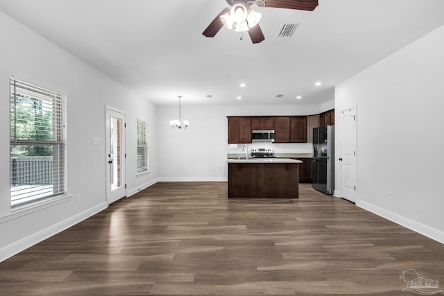 kitchen with dark brown cabinets, ceiling fan with notable chandelier, appliances with stainless steel finishes, visible vents, and recessed lighting