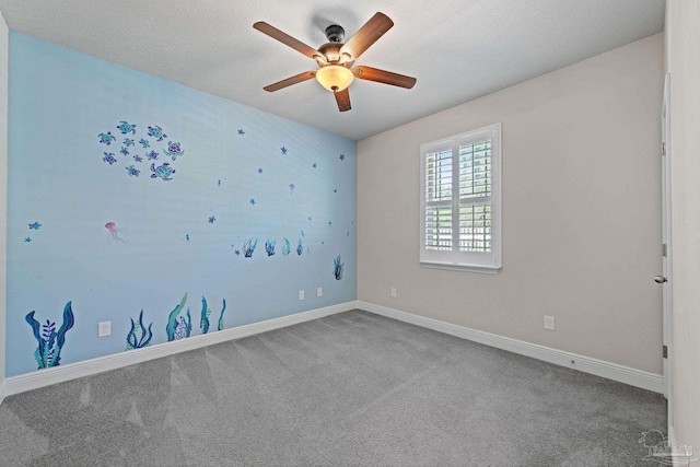 12789 Island Spirit Dr, Pensacola, FL 32506 - unfurnished room featuring ceiling fan, baseboards, and carpet flooring