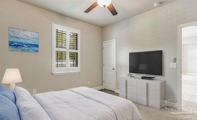 12789 Island Spirit Dr, Pensacola, FL 32506 - bedroom with baseboards, a ceiling fan, and carpet floors