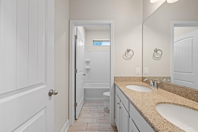 12789 Island Spirit Dr, Pensacola, FL 32506 - bathroom with double vanity, toilet, bathtub / shower combination, and a sink