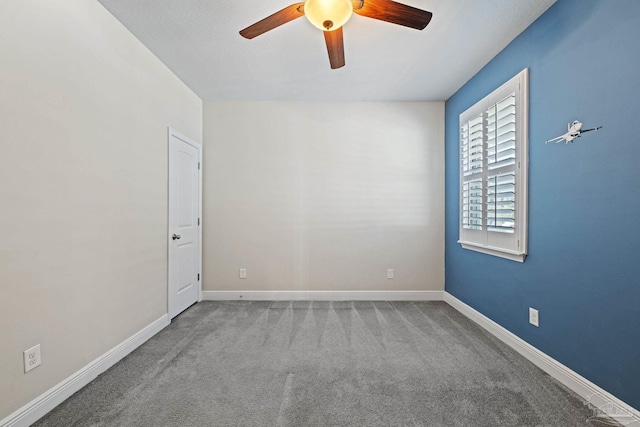12789 Island Spirit Dr, Pensacola, FL 32506 - carpeted empty room featuring baseboards and a ceiling fan