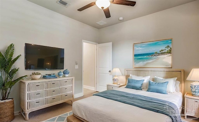 12789 Island Spirit Dr, Pensacola, FL 32506 - bedroom with baseboards, visible vents, and ceiling fan