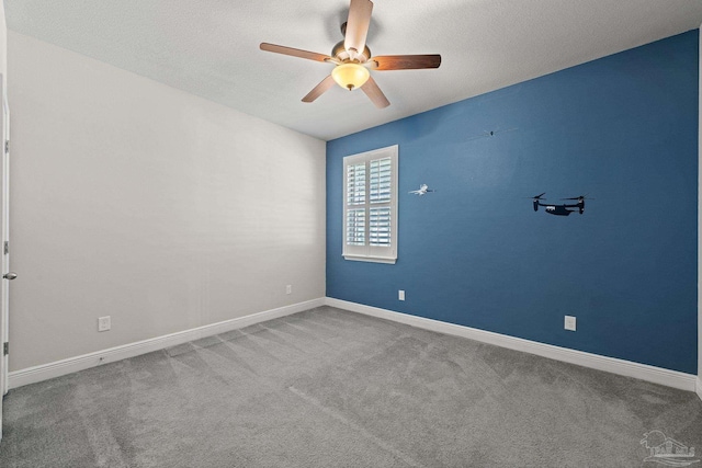 12789 Island Spirit Dr, Pensacola, FL 32506 - carpeted empty room featuring a ceiling fan and baseboards