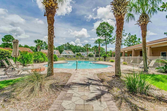 12789 Island Spirit Dr, Pensacola, FL 32506 - community pool with fence and a patio