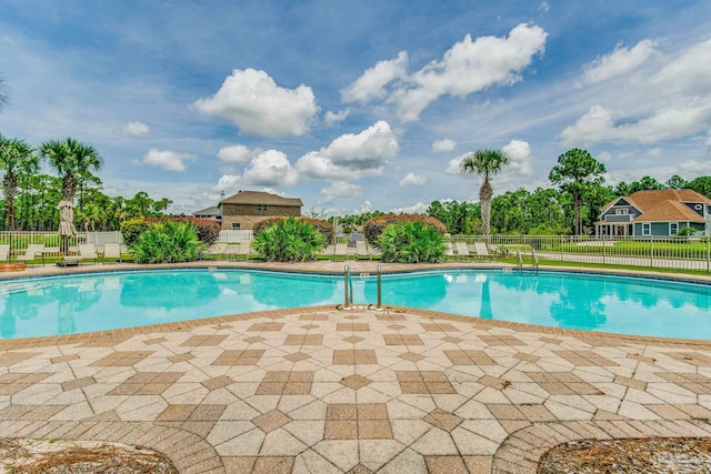 12789 Island Spirit Dr, Pensacola, FL 32506 - view of pool with fence, a fenced in pool, and a patio