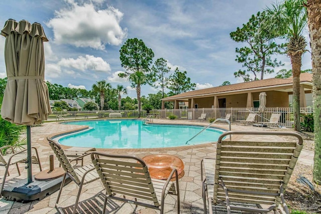 12789 Island Spirit Dr, Pensacola, FL 32506 - pool featuring fence and a patio area