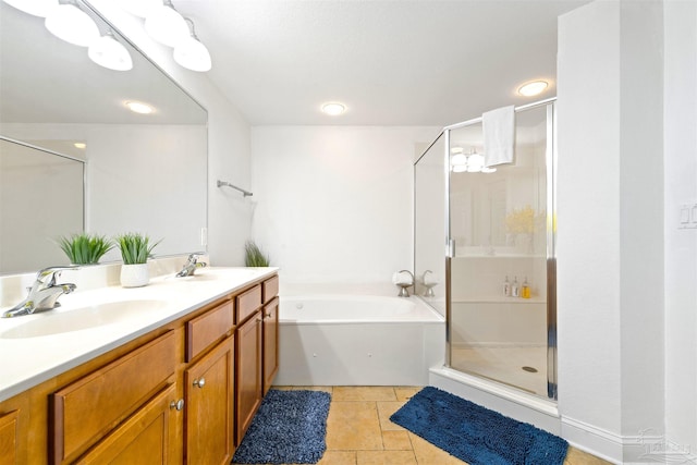 bathroom with plus walk in shower, tile patterned flooring, and vanity