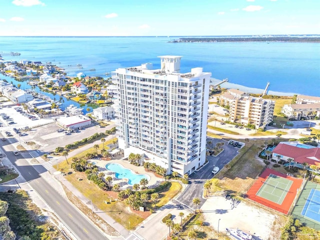 birds eye view of property with a water view