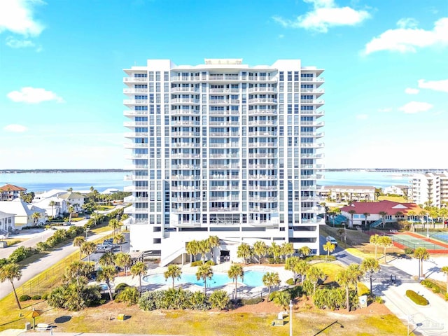 view of building exterior with a water view