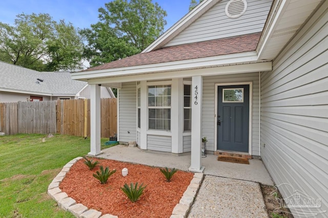 4546 Northpointe Pl, Pensacola, FL 32514 - property entrance with a shingled roof and covered porch
