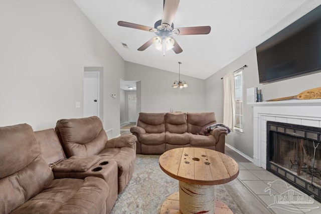 4546 Northpointe Pl, Pensacola, FL 32514 - living area with lofted ceiling, a ceiling fan, a tile fireplace, a chandelier, and baseboards