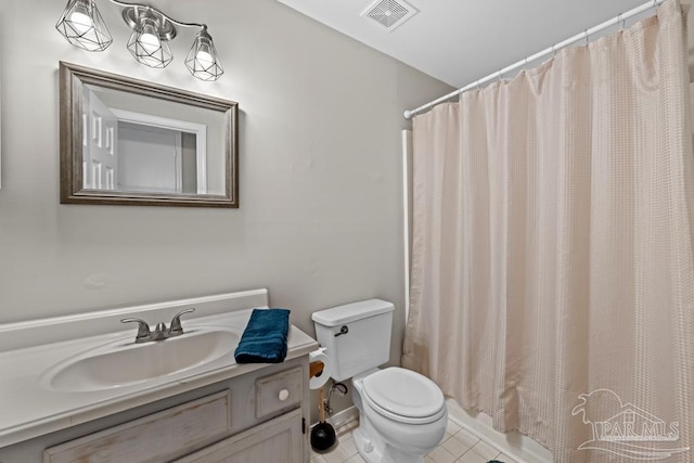 4546 Northpointe Pl, Pensacola, FL 32514 - bathroom with toilet, tile patterned flooring, vanity, and a shower with shower curtain