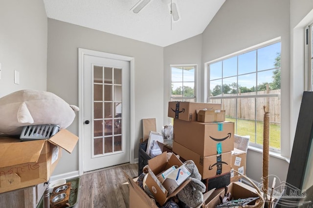 4546 Northpointe Pl, Pensacola, FL 32514 - living area featuring ceiling fan, wood finished floors, and vaulted ceiling
