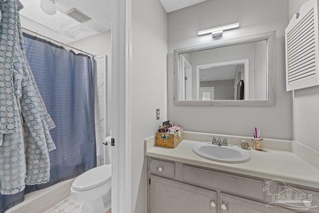 4546 Northpointe Pl, Pensacola, FL 32514 - bathroom featuring toilet, a shower with shower curtain, vanity, and a textured ceiling