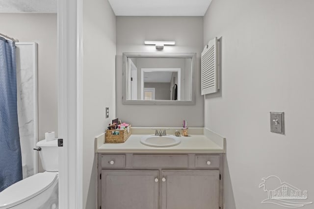 4546 Northpointe Pl, Pensacola, FL 32514 - full bathroom featuring toilet, vanity, and curtained shower