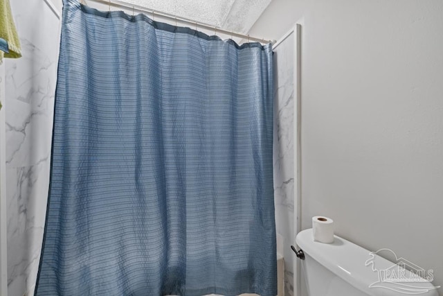 4546 Northpointe Pl, Pensacola, FL 32514 - bathroom with toilet, a textured ceiling, and shower / bath combination with curtain