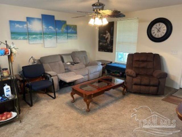 8714 Figland Ave, Pensacola, FL 32534 - living room with carpet and ceiling fan