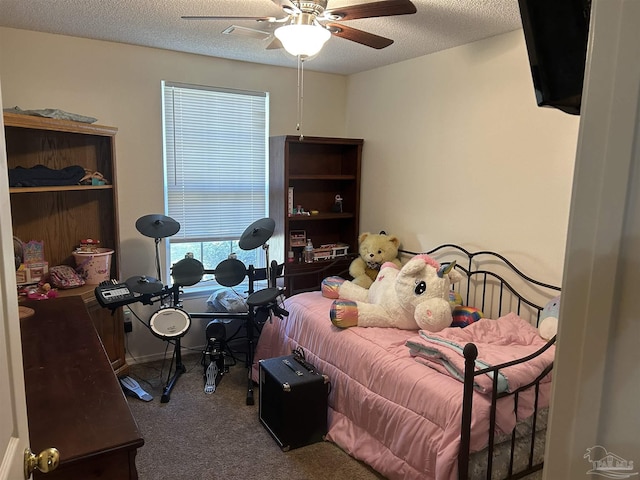 8714 Figland Ave, Pensacola, FL 32534 - bedroom featuring carpet flooring, a textured ceiling, and ceiling fan