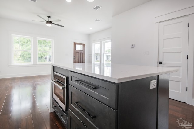 502 W Gregory St, Pensacola, FL 32502 - kitchen featuring ceiling fan, plenty of natural light, dark wood-type flooring, stainless steel oven, and recessed lighting