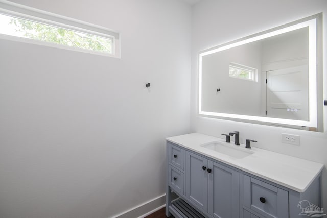 502 W Gregory St, Pensacola, FL 32502 - bathroom featuring vanity and baseboards