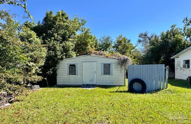 view of outdoor structure featuring a yard