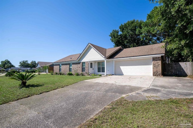 ranch-style house with a garage and a front lawn