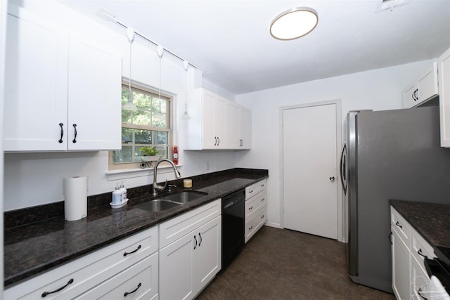 kitchen featuring dishwasher, white cabinets, stainless steel refrigerator, sink, and dark stone countertops