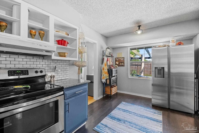 kitchen featuring dark wood finished floors, appliances with stainless steel finishes, blue cabinets, and under cabinet range hood