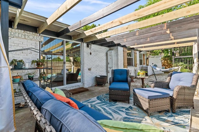 view of patio / terrace featuring outdoor lounge area and a pergola