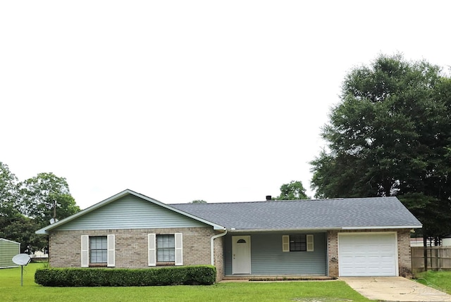 1900 W Kingsfield Rd, Cantonment, FL 32533 - ranch-style house featuring brick siding, an attached garage, concrete driveway, and a shingled roof