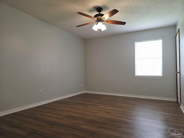 1900 W Kingsfield Rd, Cantonment, FL 32533 - unfurnished room with ceiling fan, dark wood-style floors, and a textured ceiling