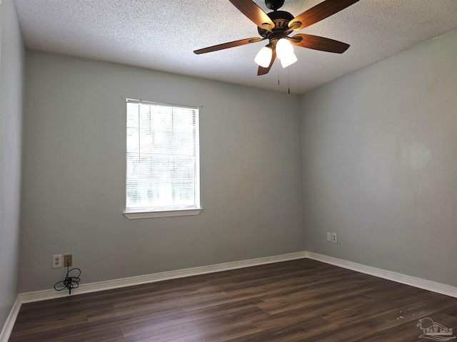 1900 W Kingsfield Rd, Cantonment, FL 32533 - empty room featuring dark wood-style floors, a textured ceiling, and a ceiling fan