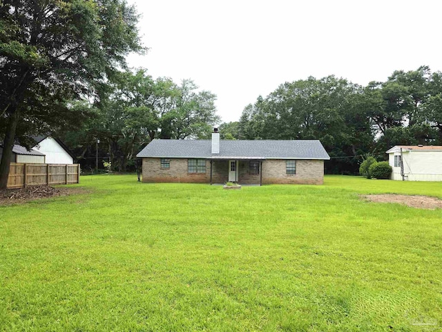 1900 W Kingsfield Rd, Cantonment, FL 32533 - back of property with a chimney and brick siding