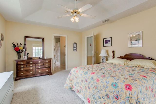 3017 Southsky Ln, Pensacola, FL 32506 - carpeted bedroom featuring a ceiling fan and a tray ceiling