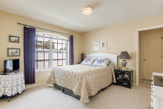 3017 Southsky Ln, Pensacola, FL 32506 - bedroom with baseboards, carpet, and a textured ceiling