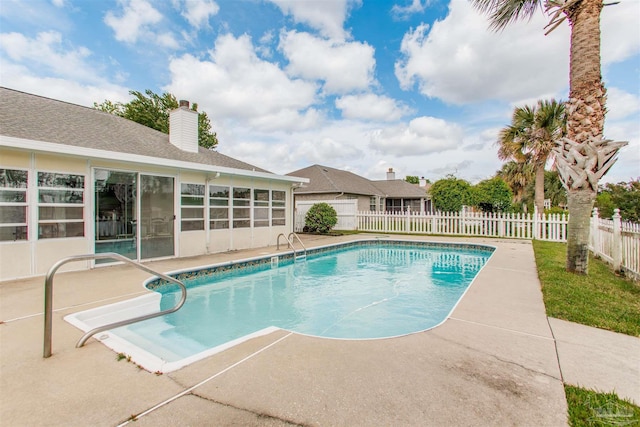 3017 Southsky Ln, Pensacola, FL 32506 - view of pool featuring fence, a patio, and a sunroom