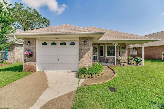 3881 Windsor Castle Blvd, Milton, FL 32583 - single story home featuring driveway, an attached garage, brick siding, a front lawn, and roof with shingles