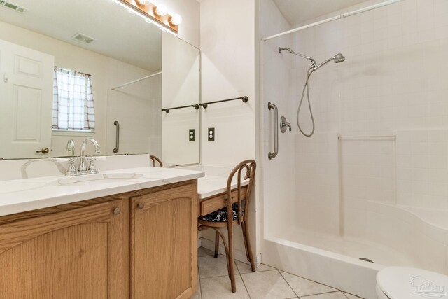 3881 Windsor Castle Blvd, Milton, FL 32583 - full bathroom with tile patterned flooring, a shower, toilet, and vanity