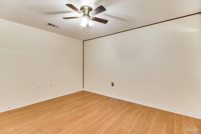 3881 Windsor Castle Blvd, Milton, FL 32583 - spare room featuring light wood-style flooring, a ceiling fan, and baseboards
