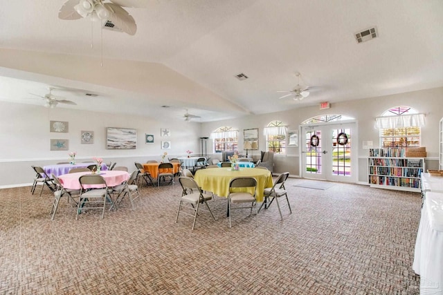 3881 Windsor Castle Blvd, Milton, FL 32583 - carpeted dining space with ceiling fan, vaulted ceiling, and baseboards